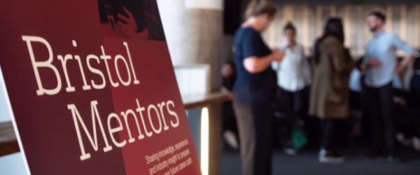 A picture of a standee with Bristol mentors written on it
